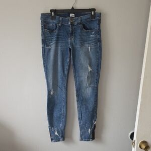 Sneak Peek Low rise Classic Blue Skinny Jeans With Zipper Leg Detail. Size 9
